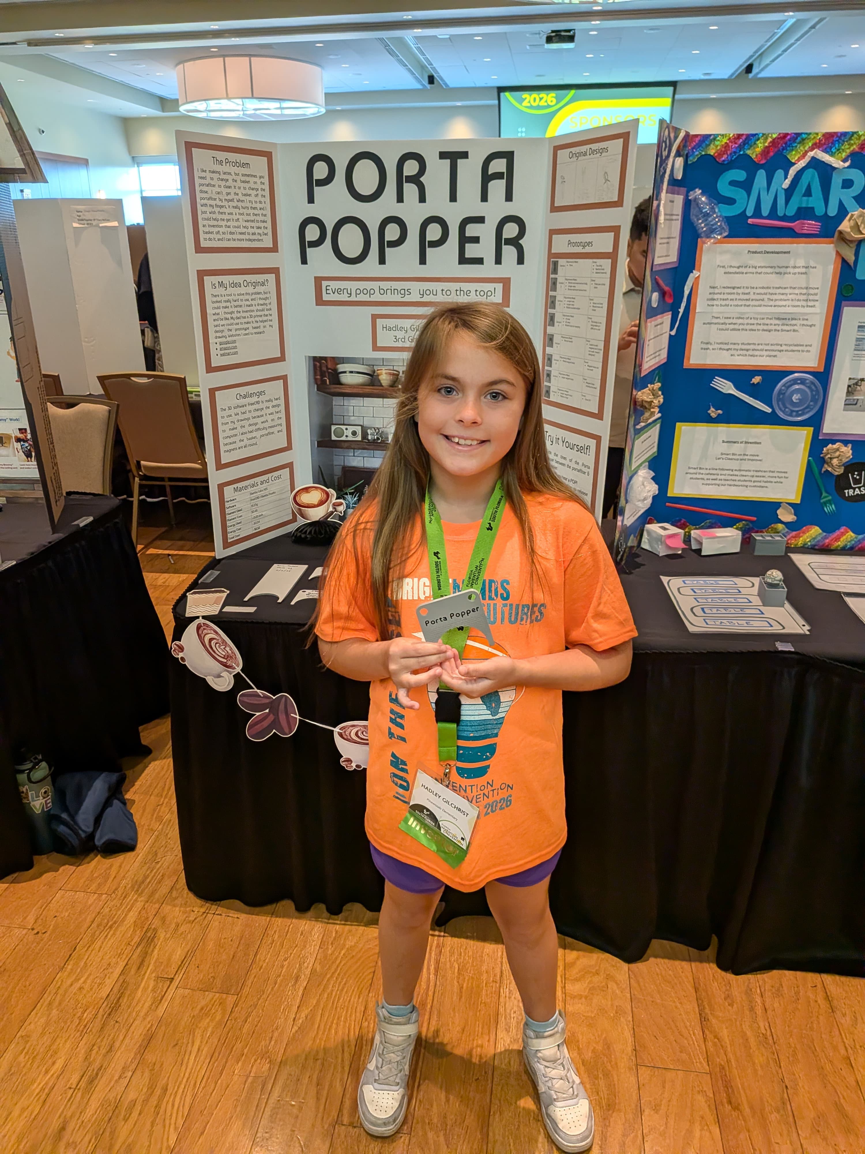Hadley with her state competition posterboard, alternate angle
