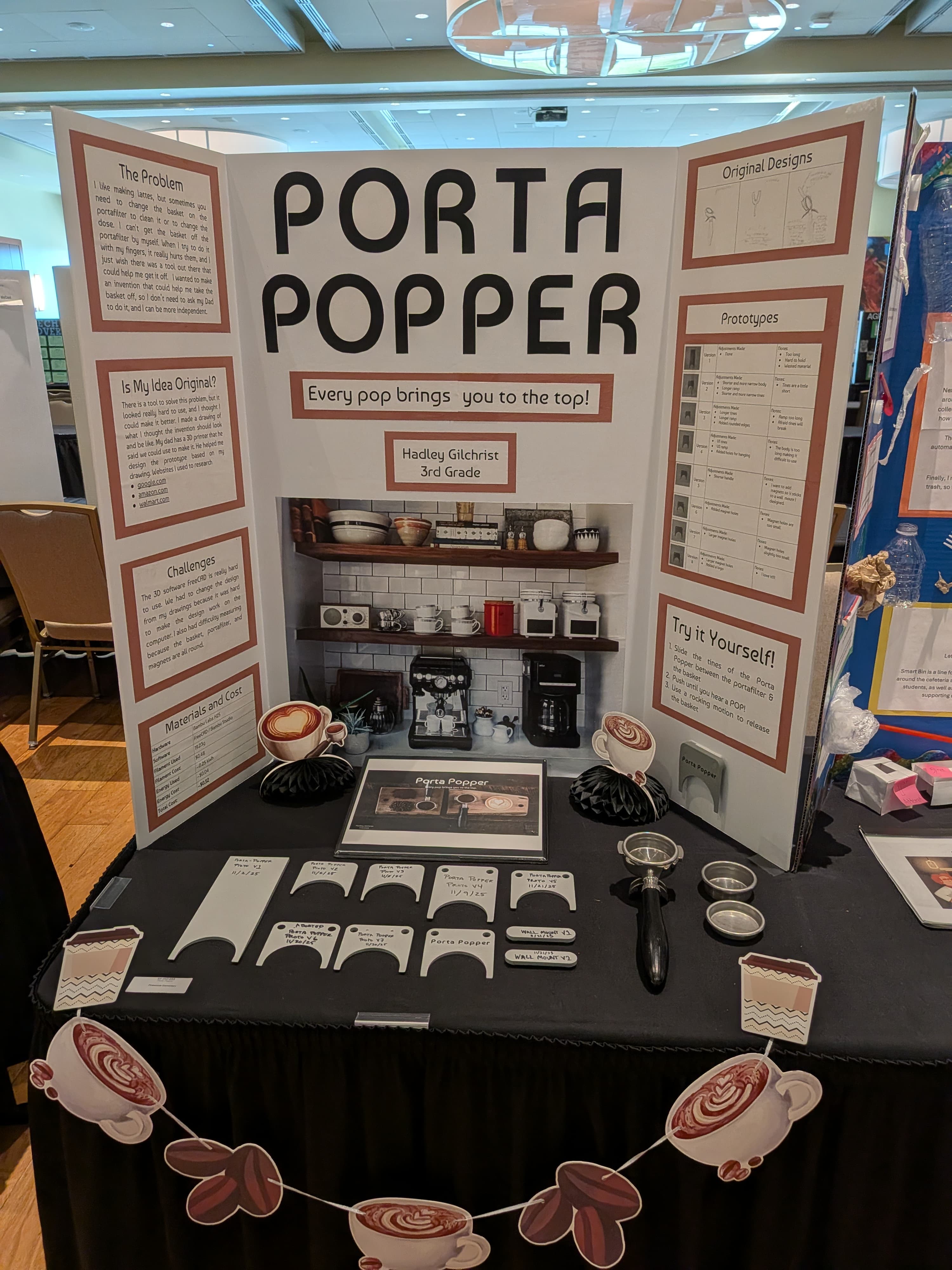 Hadley next to her state competition posterboard for the Porta Popper